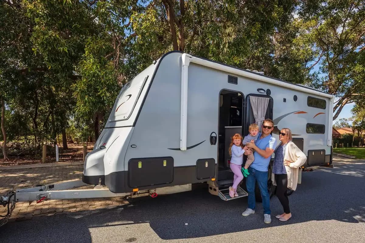 Caravan parked in the Kennedy RV yard, golden hour