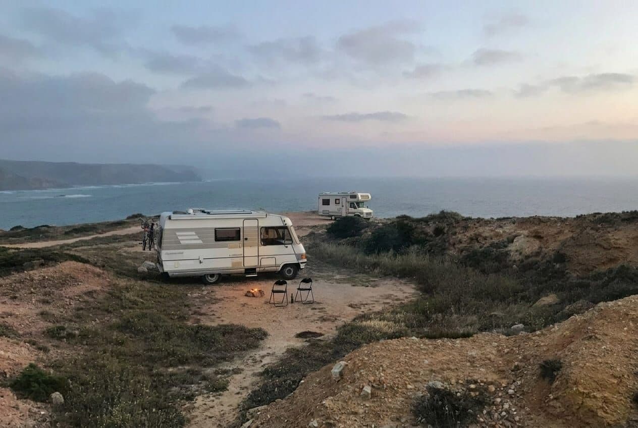 Compact caravan parked at a lookout